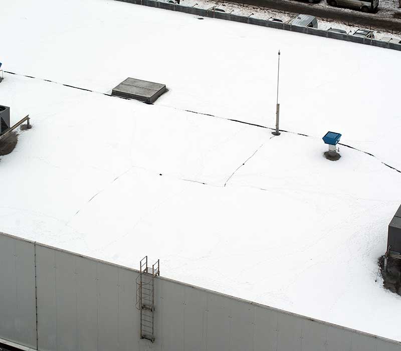 Top view of a typical, flat white commercial roof